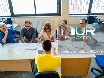 Oral exam board for a candidate at I.I.S.S. ''Mons. Antonio Bello'' vocational institute in Molfetta, the first day of high school graduatio...