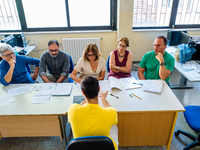 Oral exam board for a candidate at I.I.S.S. ''Mons. Antonio Bello'' vocational institute in Molfetta, the first day of high school graduatio...