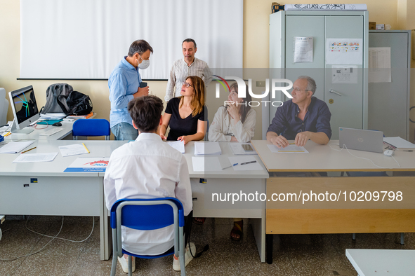 Oral exam board for a candidate at I.I.S.S. ''Mons. Antonio Bello'' vocational institute in Molfetta, the first day of high school graduatio...