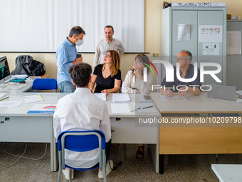 Oral exam board for a candidate at I.I.S.S. ''Mons. Antonio Bello'' vocational institute in Molfetta, the first day of high school graduatio...