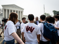 Christopher Banks, Director of Education and Workplace Policy with the Urban League of Portland speaks with students from Washington Adventi...