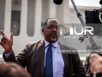 Christopher Banks, Director of Education and Workplace Policy with the Urban League of Portland speaks reporters following the Supreme Court...