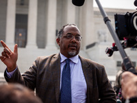 Christopher Banks, Director of Education and Workplace Policy with the Urban League of Portland speaks reporters following the Supreme Court...