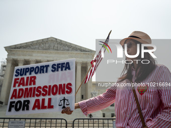 Min Chen of the DC chapter of the Asian America  Political Action Committee celebrates theUS Supreme Court ruling that universities may not...