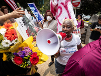 Activist Nadine Seiler voices her displeasure with the US Supreme Court ruling that universities may not consider race in admissions, amid a...