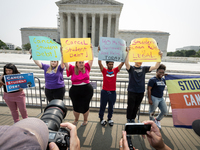 Students protest at the Supreme Court after it rules against President Joe Biden’s student-debt relief program.  The opinion does not prohib...