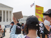 Demonstrators gather outside of the Supreme Court in Washington, D.C. on June 30, 2023 following the Supreme Court's ruling that President B...