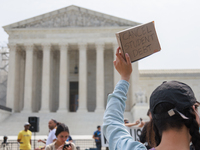 Demonstrators gather outside of the Supreme Court in Washington, D.C. on June 30, 2023 following the Supreme Court's ruling that President B...