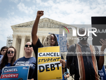 Students protest the Supreme Court's ruling against President Joe Biden’s student-debt relief program.  The opinion does not prohibit studen...