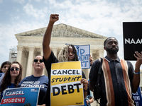 Students protest the Supreme Court's ruling against President Joe Biden’s student-debt relief program.  The opinion does not prohibit studen...