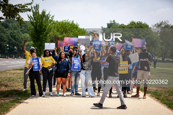 Students march to the White House in protest of the Supreme Court's ruling against President Joe Biden’s student-debt relief program.  The o...