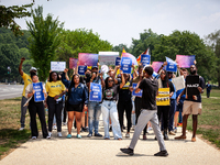 Students march to the White House in protest of the Supreme Court's ruling against President Joe Biden’s student-debt relief program.  The o...