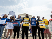 Students protest the Supreme Court;s ruling against President Joe Biden’s student-debt relief program.  The opinion does not prohibit studen...