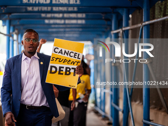 Wisdom Cole, National Director of the NAACP Youth and College Division, partcipates in a march protesting the Supreme Court's ruling against...