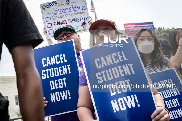 Students protest the Supreme Court's ruling against President Joe Biden’s student-debt relief program.  The opinion does not prohibit studen...