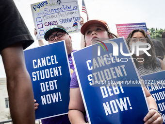 Students protest the Supreme Court's ruling against President Joe Biden’s student-debt relief program.  The opinion does not prohibit studen...