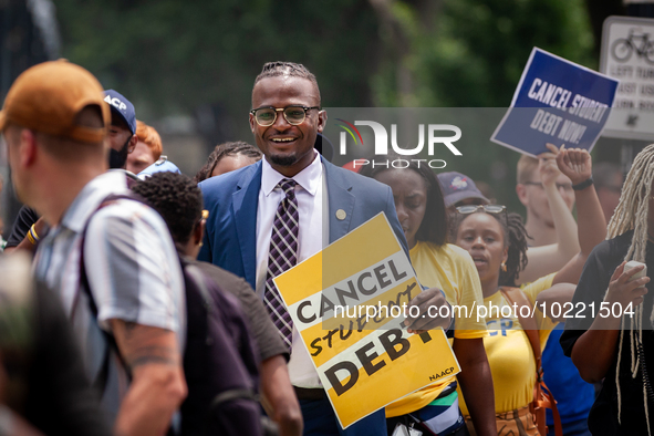 Wisdom Cole, National Director of the NAACP Youth and College Division, partcipates in a march protesting the Supreme Court's ruling against...