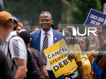 Wisdom Cole, National Director of the NAACP Youth and College Division, partcipates in a march protesting the Supreme Court's ruling against...