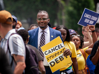 Wisdom Cole, National Director of the NAACP Youth and College Division, partcipates in a march protesting the Supreme Court's ruling against...