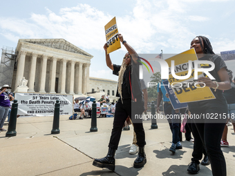 Students depart on a march to the White House in protest of the Supreme Court's ruling against President Joe Biden’s student-debt relief pro...