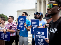 Students protest the Supreme Court's ruling against President Joe Biden’s student-debt relief program.  The opinion does not prohibit studen...