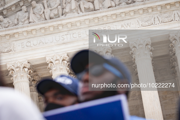 Students protest the Supreme Court's ruling against President Joe Biden’s student-debt relief program.  The opinion does not prohibit studen...