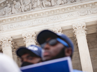 Students protest the Supreme Court's ruling against President Joe Biden’s student-debt relief program.  The opinion does not prohibit studen...