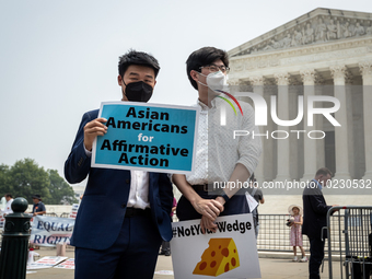 Asian-Americans protest against the US Supreme Court ruling that universities cannot consider race in admissions.  The pair of cases brought...