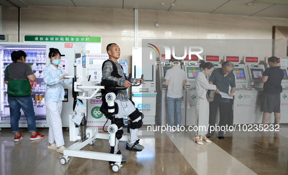 

Medical staff are using a lower limb rehabilitation robot to help patients recover in Chongqing, China, on July 4, 2023. 