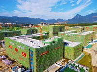 

An aerial photo shows the construction of the new schools of Yuexi Middle School in Anqing City, Anhui Province, China on July 5, 2023. (