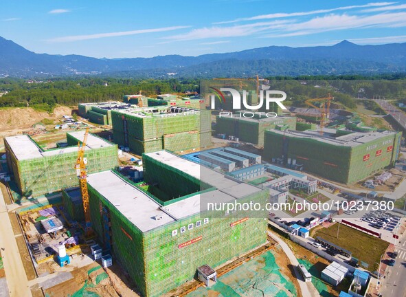 

An aerial photo shows the construction of the new schools of Yuexi Middle School in Anqing City, Anhui Province, China on July 5, 2023. 