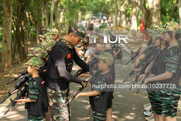 

Children are training during a tactical action program at a military summer camp in Hefei, Anhui Province, China on July 5, 2023. 