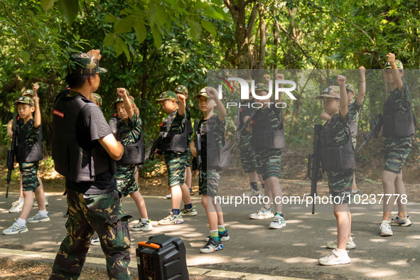 

Children are training for a special sign language program at a military summer camp in Hefei, Anhui Province, China on July 5, 2023. 