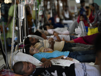 People suffering from dengue fever as they admitted for treatment at a government hospital in Dhaka, Bangladesh, on June 05, 2023. The dengu...