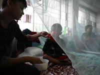 Bangladeshi Child dengue patients lying on the bed inside the Dhaka Child Hospital admission section in Dhaka, Bangladesh, on July 8, 2023....