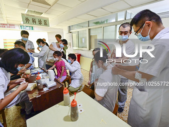 

At the Rehabilitation Department of Traditional Chinese Medicine of the People's Hospital in Qingzhou City, Shandong Province, China, a me...