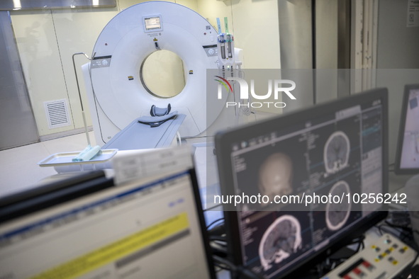 A General view showing a CT Scanner with a screen showing a ct scan of a brain inside the Central Government-aided Emergency Hospital on Jul...