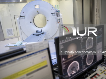 A General view showing a CT Scanner with a screen showing a ct scan of a brain inside the Central Government-aided Emergency Hospital on Jul...