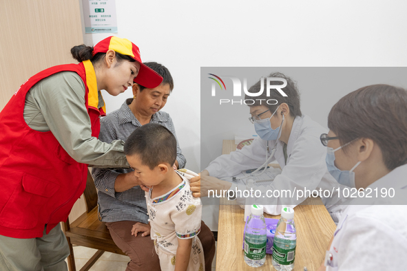 YICHANG, CHINA - JULY 13, 2023 - Photo taken on July 13, 2023 shows an expert doctor offering free medical treatment in the sorting room of...