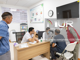 YICHANG, CHINA - JULY 13, 2023 - Photo taken on July 13, 2023 shows an expert doctor offering free medical treatment in the sorting room of...