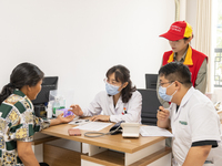 YICHANG, CHINA - JULY 13, 2023 - Photo taken on July 13, 2023 shows an expert doctor offering free medical treatment in the sorting room of...