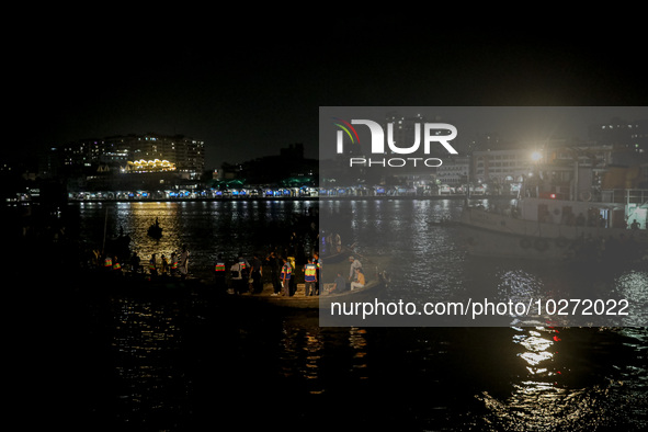 A water bus with more than half a hundred passengers sank after being hit by a sand-laden bulkhead in the Buriganga river at Sadarghat in Dh...