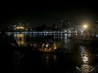 A water bus with more than half a hundred passengers sank after being hit by a sand-laden bulkhead in the Buriganga river at Sadarghat in Dh...