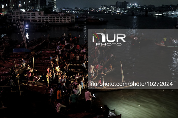 A water bus with more than half a hundred passengers sank after being hit by a sand-laden bulkhead in the Buriganga river at Sadarghat in Dh...