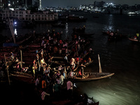 A water bus with more than half a hundred passengers sank after being hit by a sand-laden bulkhead in the Buriganga river at Sadarghat in Dh...