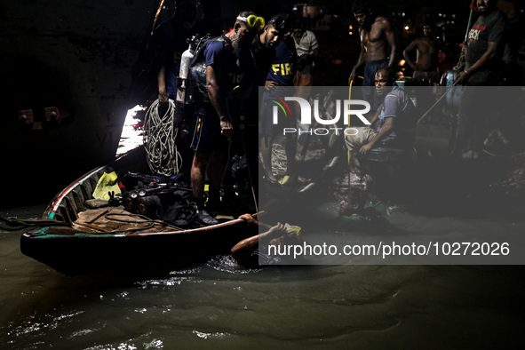 A water bus with more than half a hundred passengers sank after being hit by a sand-laden bulkhead in the Buriganga river at Sadarghat in Dh...