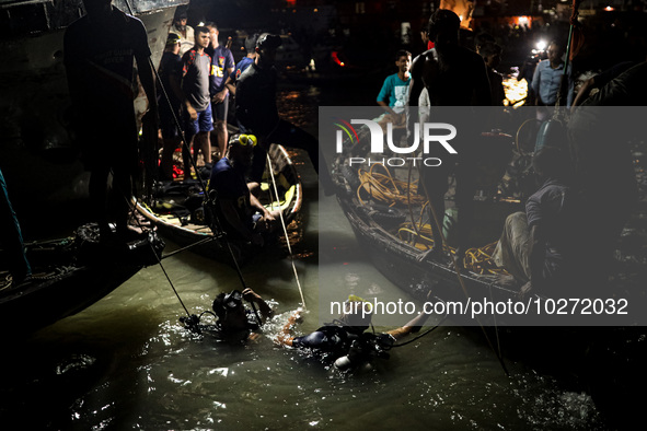 A water bus with more than half a hundred passengers sank after being hit by a sand-laden bulkhead in the Buriganga river at Sadarghat in Dh...