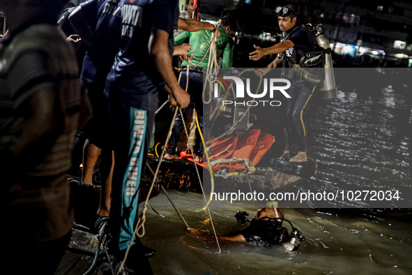 A water bus with more than half a hundred passengers sank after being hit by a sand-laden bulkhead in the Buriganga river at Sadarghat in Dh...