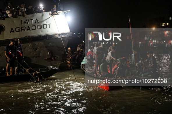 A water bus with more than half a hundred passengers sank after being hit by a sand-laden bulkhead in the Buriganga river at Sadarghat in Dh...