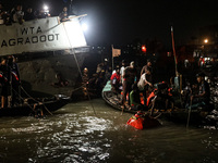 A water bus with more than half a hundred passengers sank after being hit by a sand-laden bulkhead in the Buriganga river at Sadarghat in Dh...